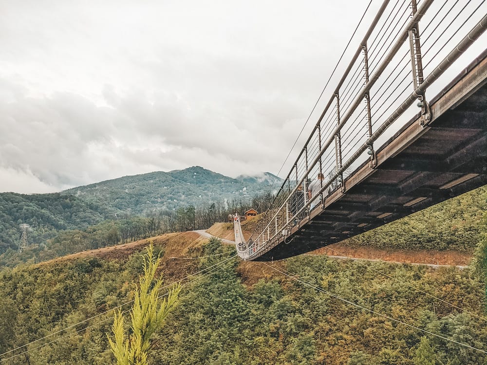 The longest suspension bridge in the United States crossing over the greenery in Gatlinburg, Tennessee.