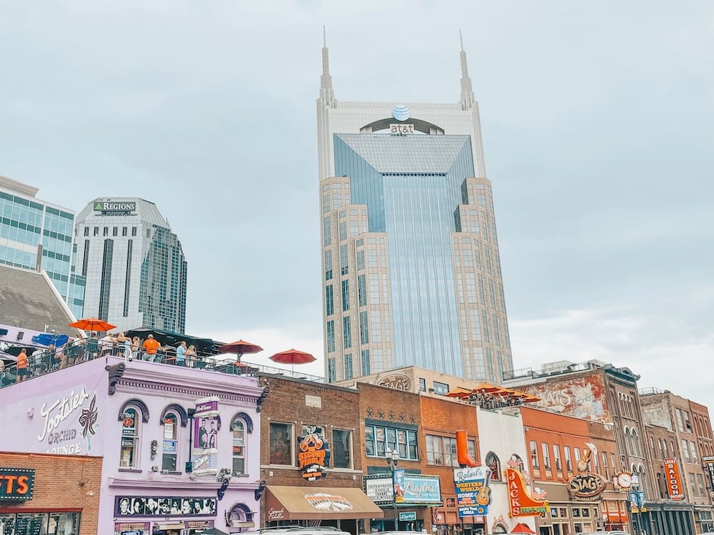 A view of the bars and honky tonks on Broadway Street in Nashville during the daytime, one of the best things to do in Nashville
