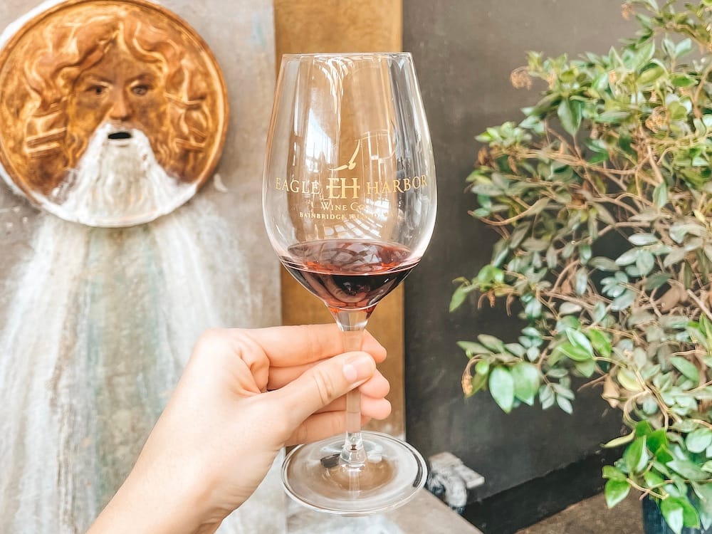 A wine glass with red wine in it at Eagle Harbor Wien Co. - one of the best things to do and see on Bainbridge Island.