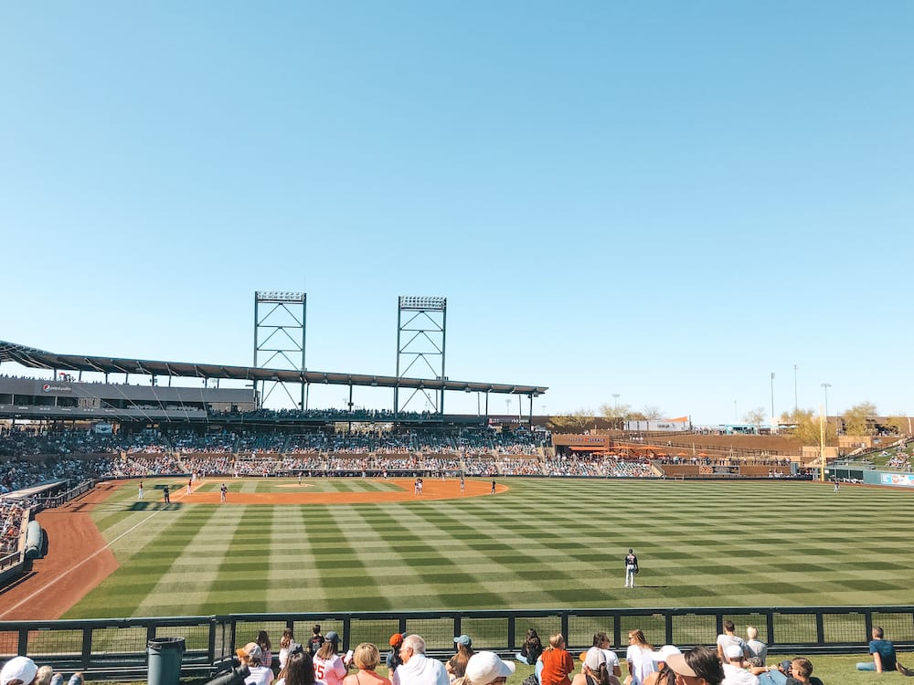 A well-manicured green baseball field in Scottsdale during a MLB spring training game