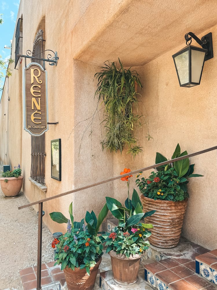The sign at the entrance of Rene, one of the best restaurants in Sedona for dinner.