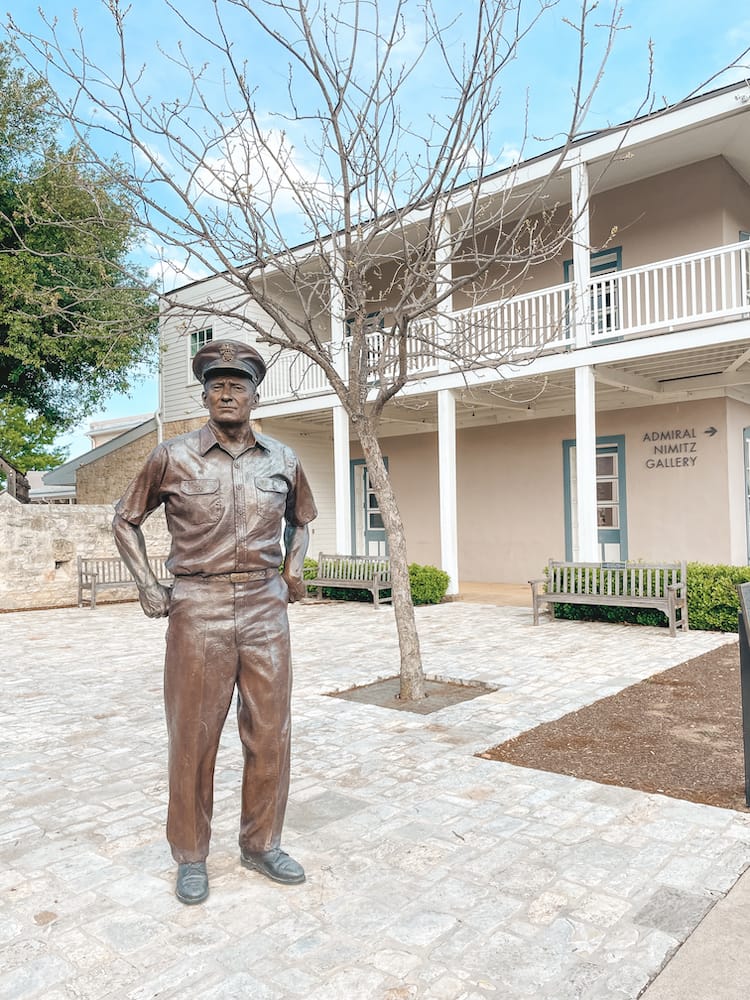 A statue of General Nimitz in front of the National Museum of the Pacific War in Fredericksburg.
