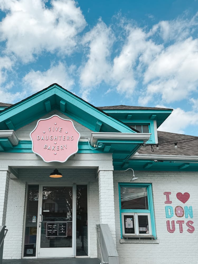 The teal and pink exterior of Five Daughters Bakery in 12 South Nashville