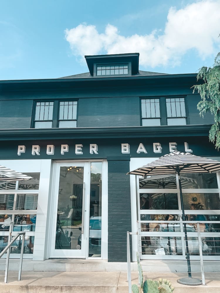 The black and white exterior of Proper Bagel, one of the best brunch spots in Nashville