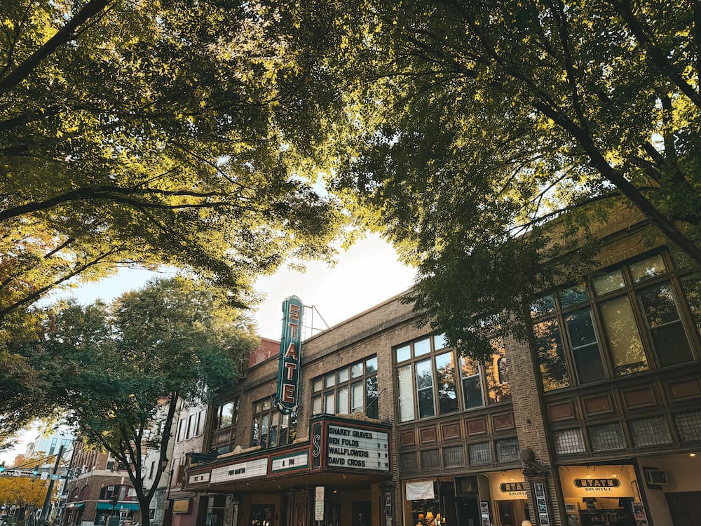 Historic Downtown Ithaca in the Finger Lakes with trees above the street