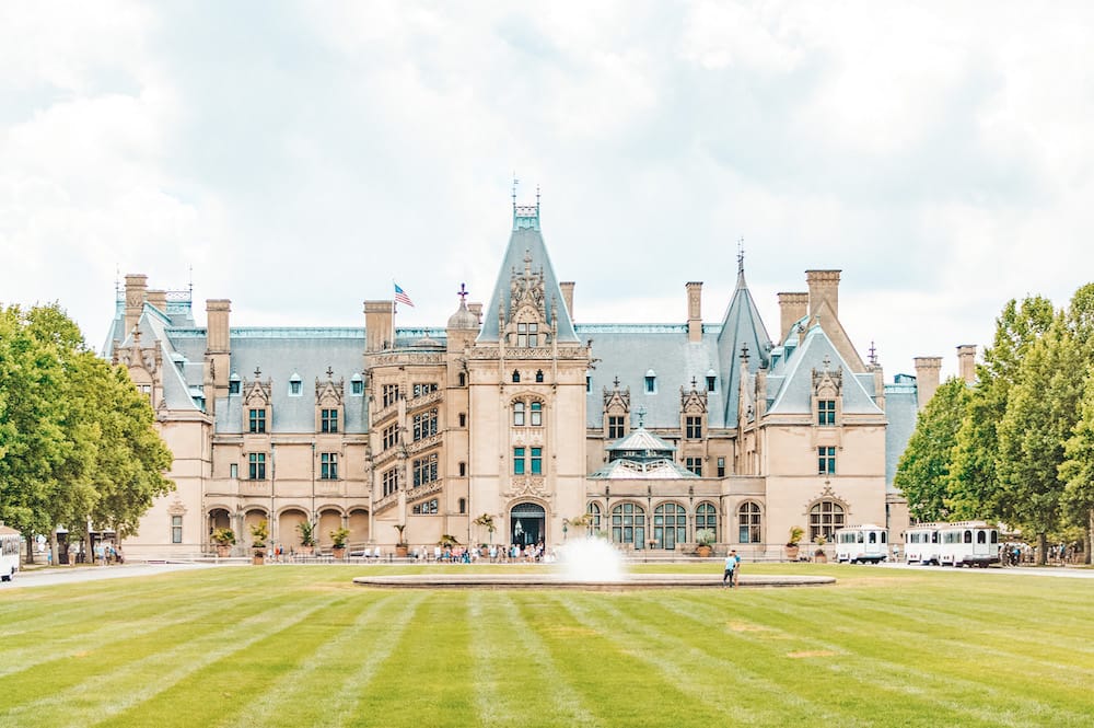 The BIltmore Estate, a large castle-like home, in the Blue Ridge Mountains in Asheville, North Carolina, one of the best day weekend trips from Nashville