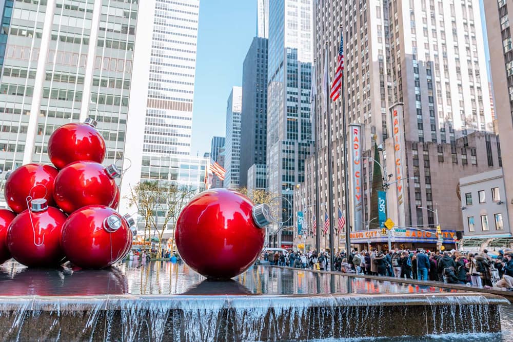 The red Christmas ornament decorations in front of Radio City Music Hall in New York City in December
