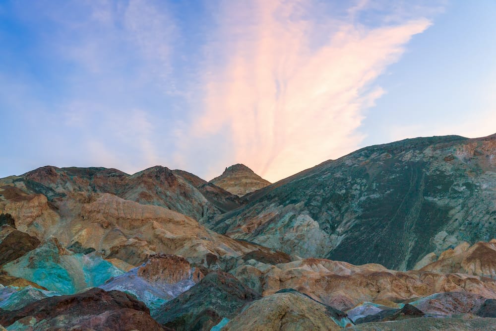 The rock and sandstone formations In Death Valley National Park at sunset.