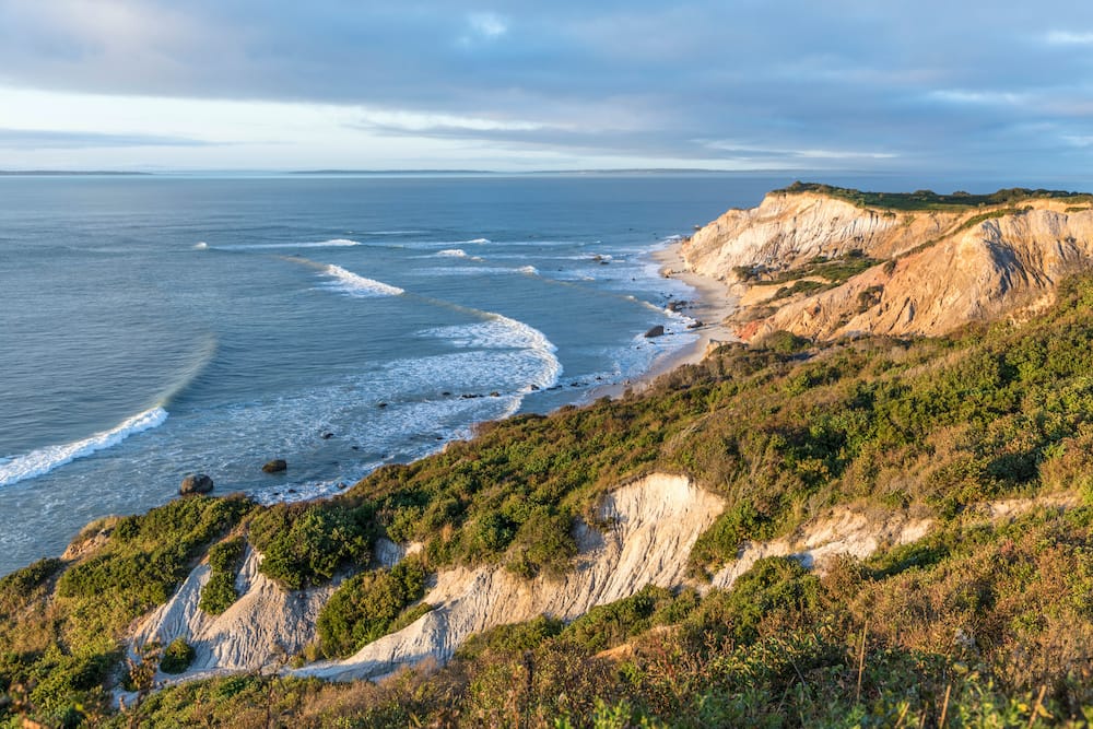 The ocean waves lapping up against the bluffs in Marth's Vineyard