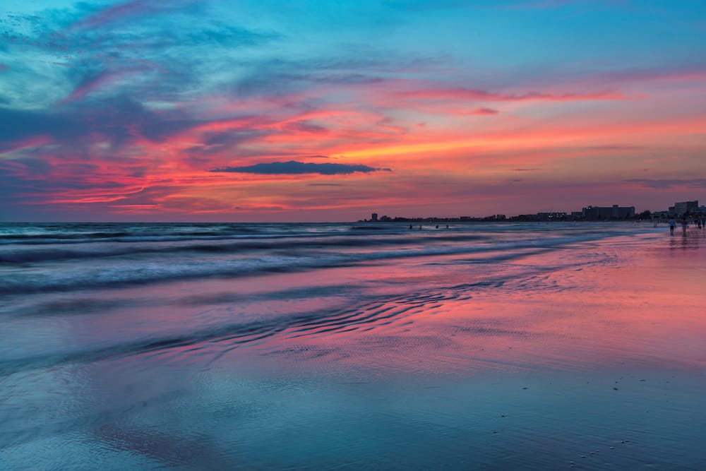 A gorgeous orange and pink sunset over the ocean at Siesta Key.