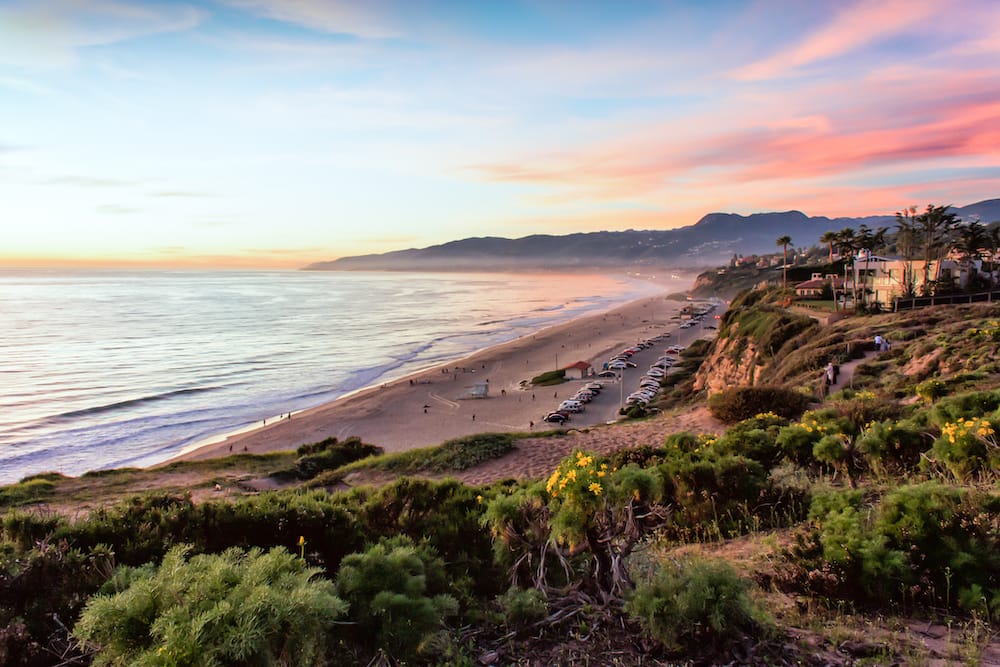 The skyline of Malibu, California at dusk.