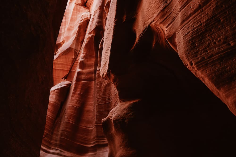 The red canyon walls with sun shining through in Antelope Canyon.