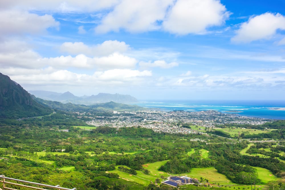 The lush greenery, blue ocean, and mountains from the Nu’uanu Pali Lookout just north of Honolulu in Oahu.