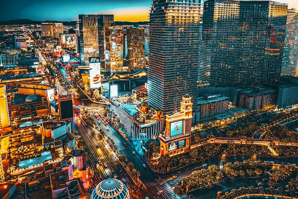 The vibrant lights of the Las Vegas Strip picture from an aerial view at nighttime.