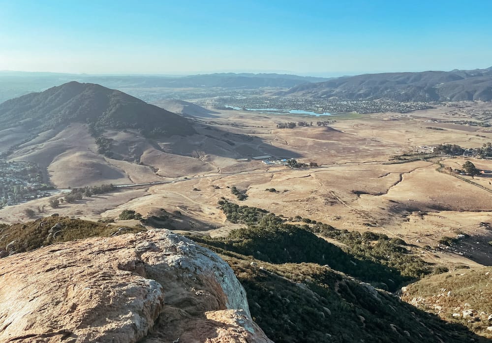 An aerial view of the arid valley in San Luis Obispo, California in February, one of the best months to visit.