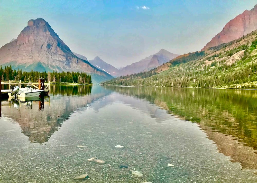 A view of the mountains from a lake in Glacier National Park.