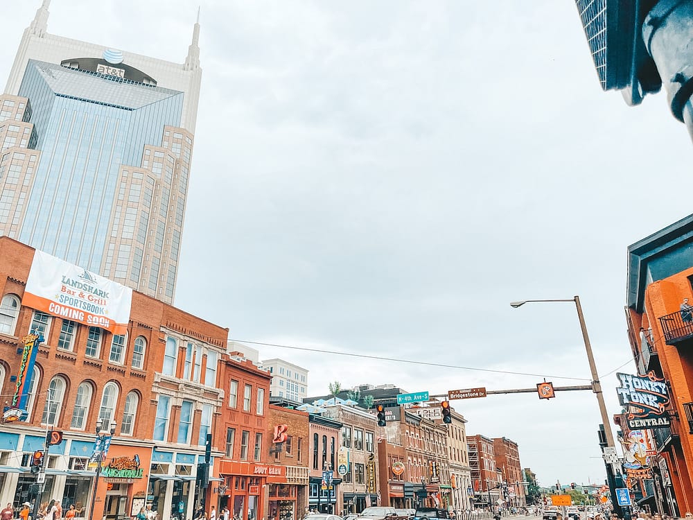 The Nashville skyline featuring the honky-tonks and best bars in Nashville on Broadway Street.