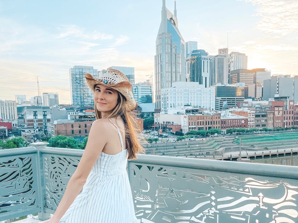 Fun Things to Do in Nashville, Tennessee - walking on the Pedestrian Bridge at sunset to see the gorgeous skyline in Nashville