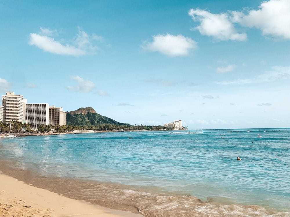 A view of Diamond Head and several resorts from Waikiki Beach on Oahu