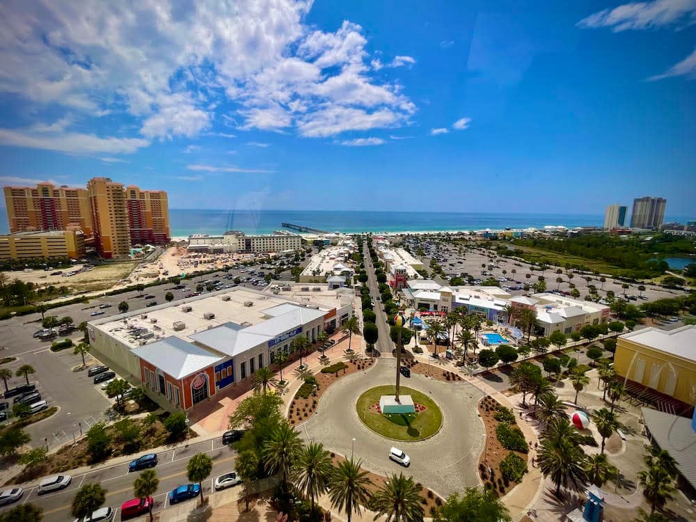 An aerial view of the beach, town, and water at Panama City Beach, Florida