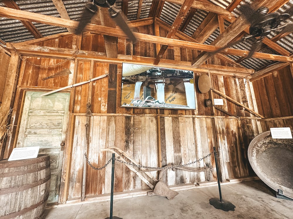 The sugarcane theater at Oak Alley Plantation, in a wooden building showing a film about the production of sugar.