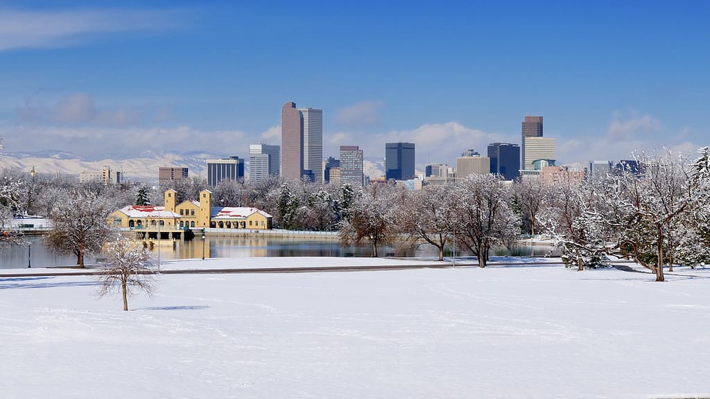A beautiful snowy cityscape photo of Denver, Colorado, one of the best places to visit in the USA in 2023.