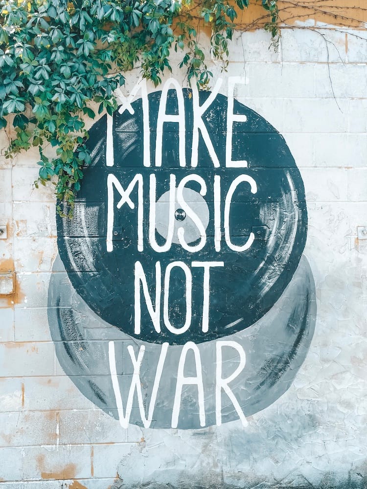 Make Music Not War painted over records in Nashville, TN