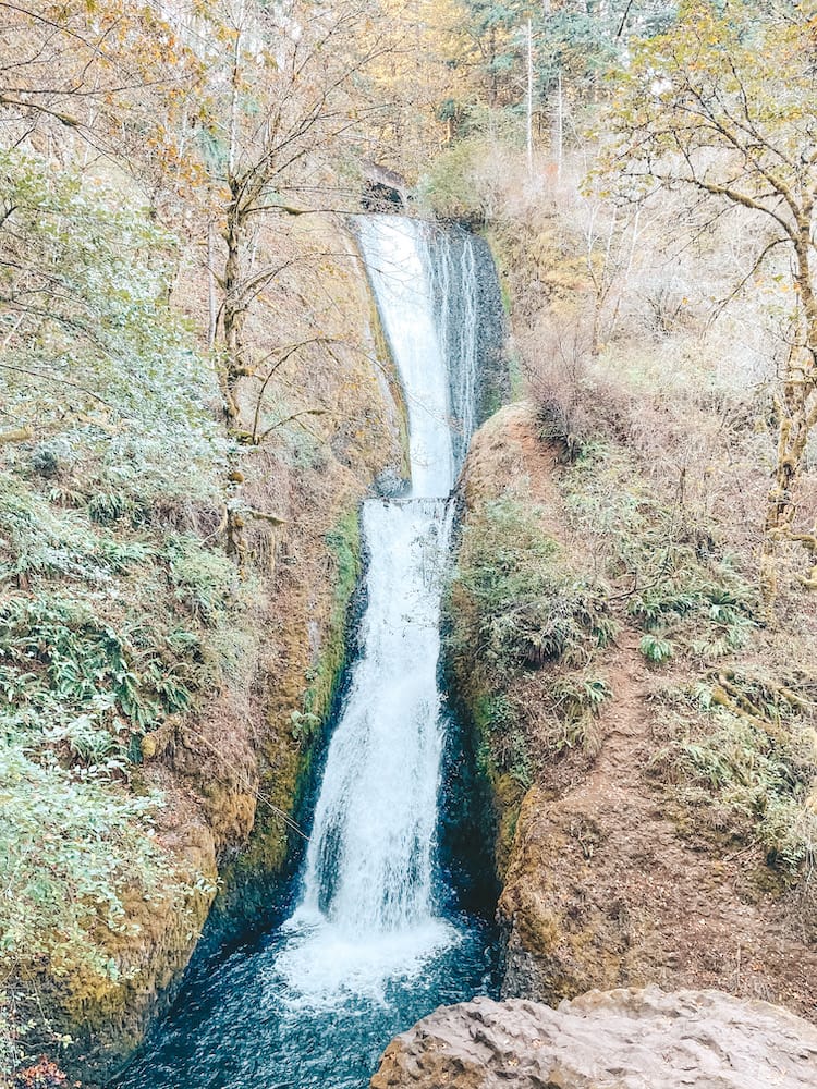 A beautiful waterfall cascading into a pool in the Columbia River Gorge