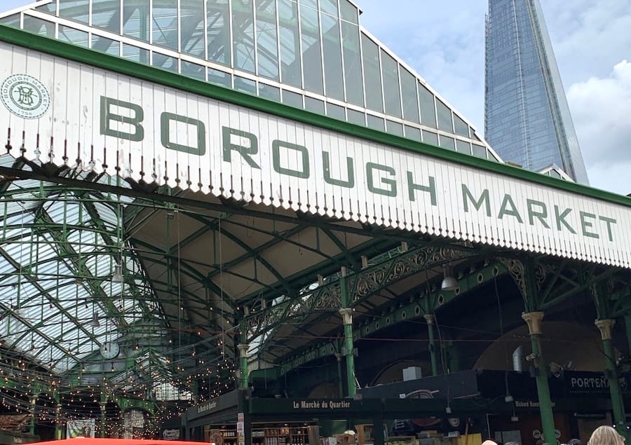 The green and white sign at the entrance of Borough Market in London.