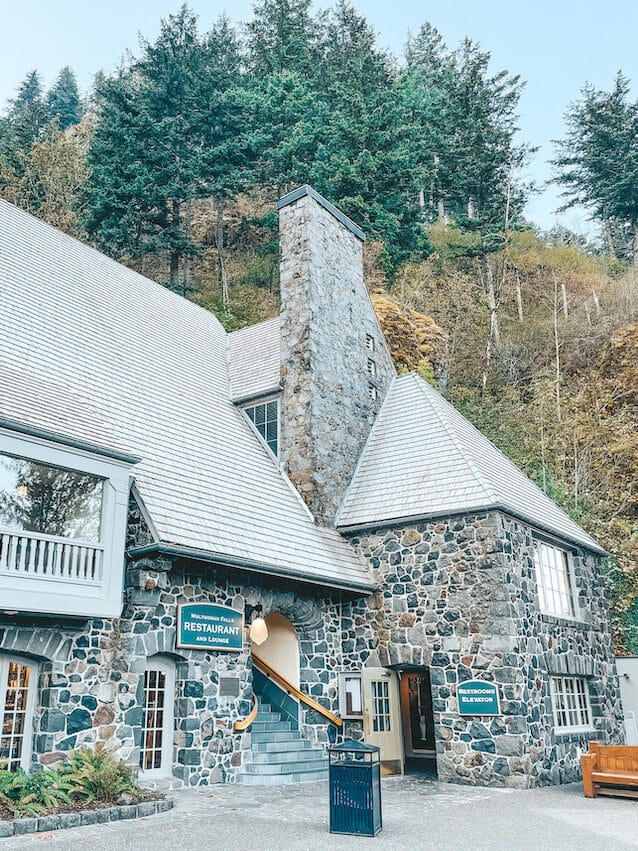 Multnomah Falls Lodge, a historic stone building alon ghte Columbia River Gorge